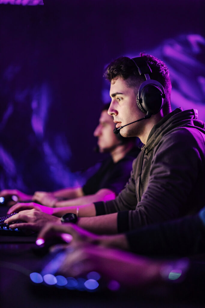 professional-gamer-playing-tournament-with-teammates-gaming-room